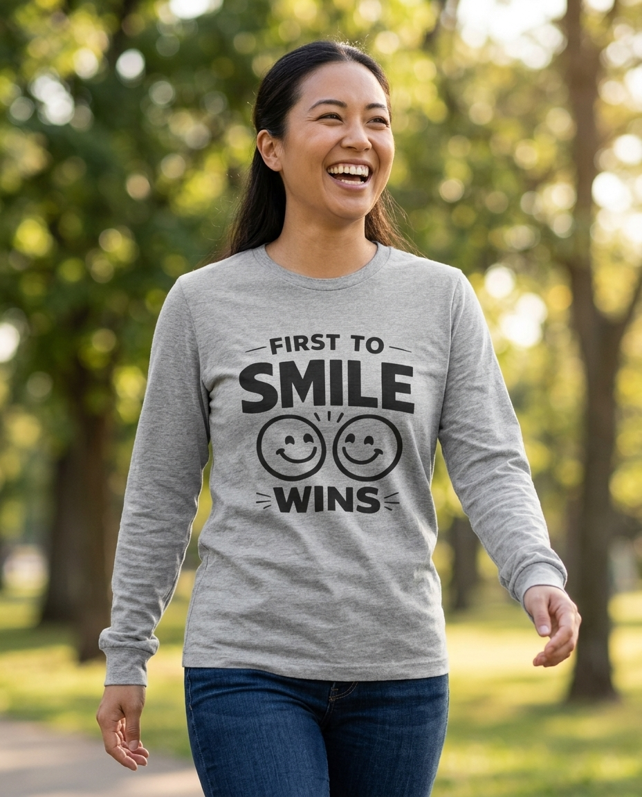 First to Smile Wins Adult Long Sleeve Tee - Light Colors