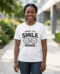 First to Smile Wins Adult Tee - Light Colors